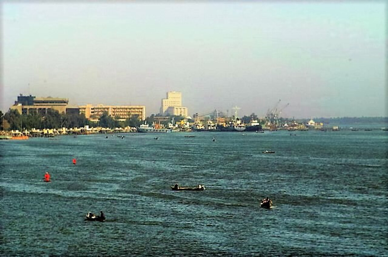 Ships and cranes along the Shatt al-Arab waterway in Basra, Iraq